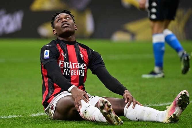 Napoli defeat all but end AC Milan's Serie A title hopes