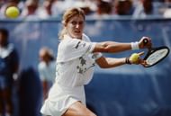 Steffi Graf currently holds the record at 377 weeks