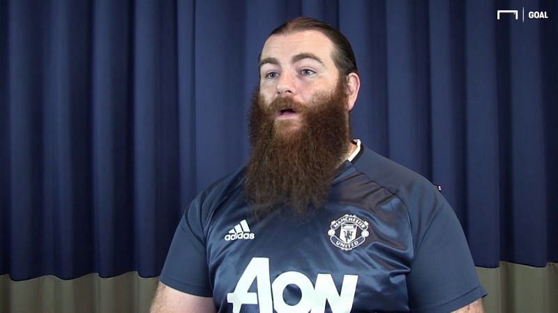 Killian Dain supports the red side of the Manchester