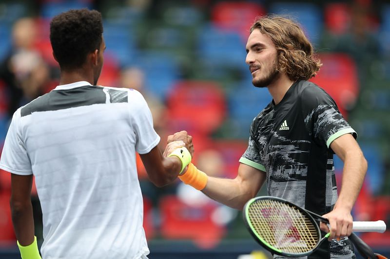 Stefanos Tsitsipas and Felix Auger-Aliassime shake hands after their match at Shanghai