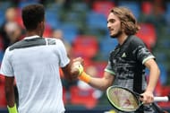Stefanos Tsitsipas and Felix Auger-Aliassime shake hands after their match at Shanghai