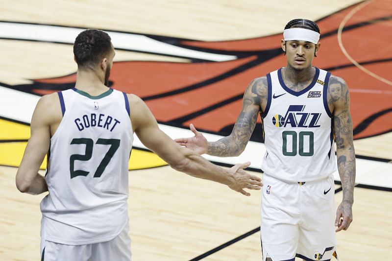 Rudy Gobert (#27) and Jordan Clarkson (#00) of the Utah Jazz