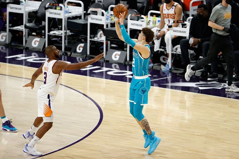 LaMelo Ball (#2) of the Charlotte Hornets puts up a three-point shot.