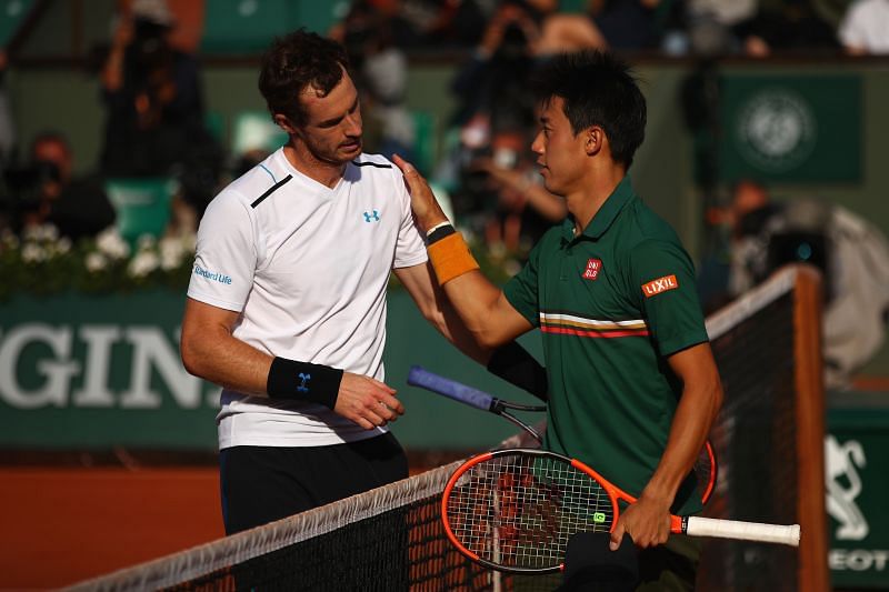 Kei Nishikori congratulates Andy Murray after their quarterfinal match at the 2017 French Open