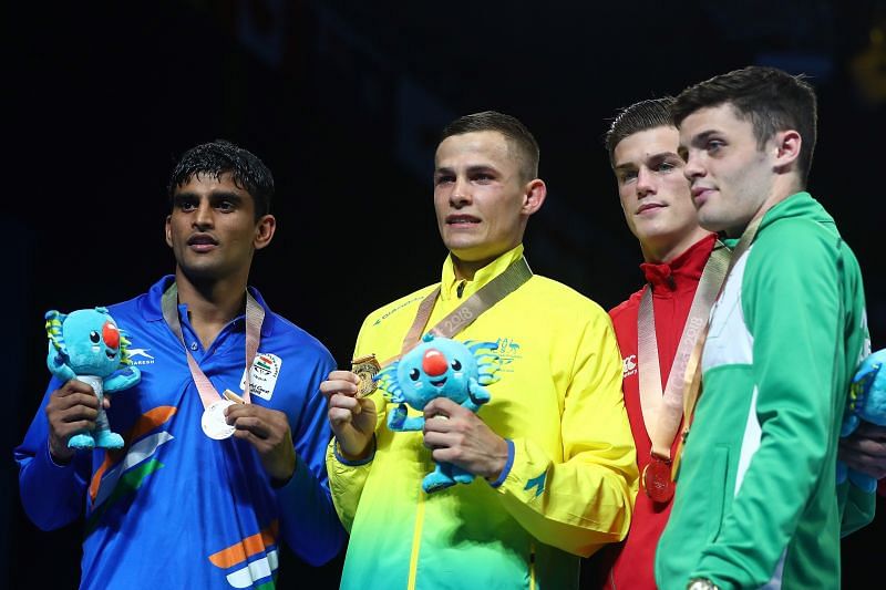 (L-R) Silver medalist Manish Kaushik, Gold medalist Harry Garside, Bronze medalists Michael McDonagh and James McGivern at the 2018 Commonwealth Games in Gold Coast, Australia