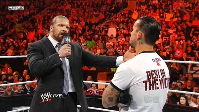 Triple H's immediate reaction to forgetting his line in a promo with CM Punk