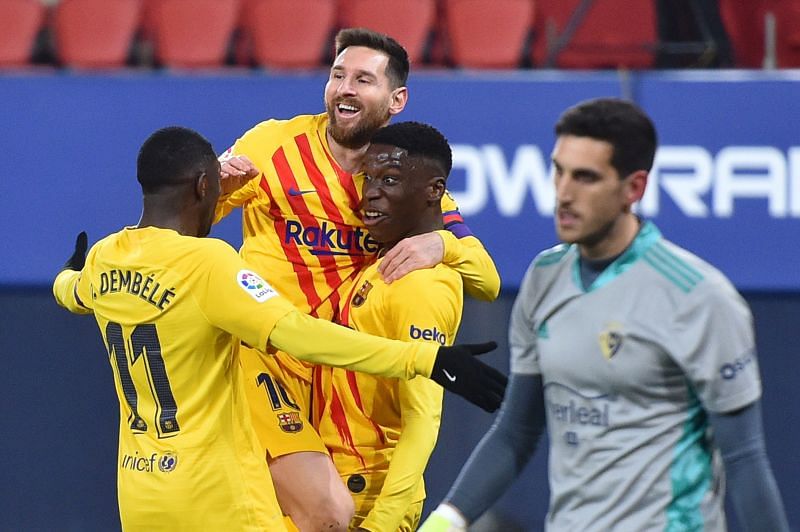 Moriba celebrates with Ousmane Dembele and Lionel Messi after scoring the club's first goal