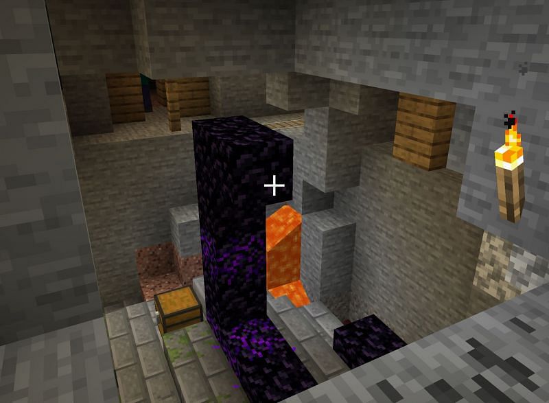 Nether portal inside mineshaft (Image via Minecraft)