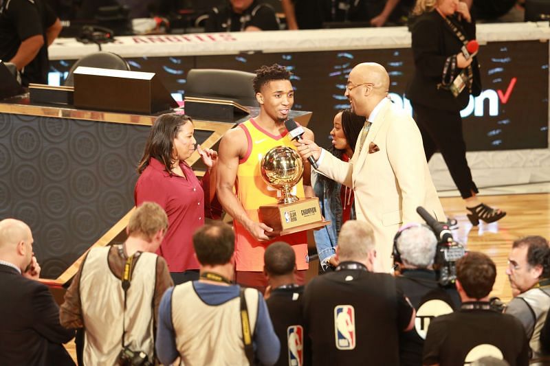 Donovan Mitchell #45 of the Utah Jazz accepts the trophy for the 2018 Verizon Slam Dunk Contest at Staples Center on February 17, 2018 in Los Angeles, California (Photo by Leon Bennett/Getty Images)