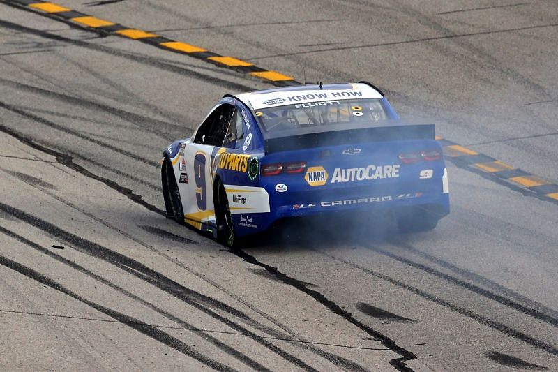 Chase Elliott goes to the garage after blowing an engine on the restart. Kevin Cox. Courtesy Getty Images