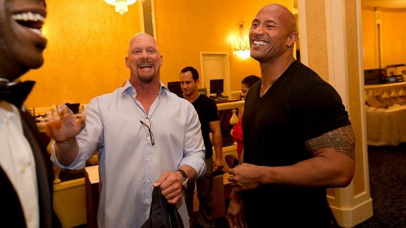 Steve Austin and The Rock share a joke behind the scenes