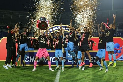 Mumbai City FC with their maiden ISL trophy