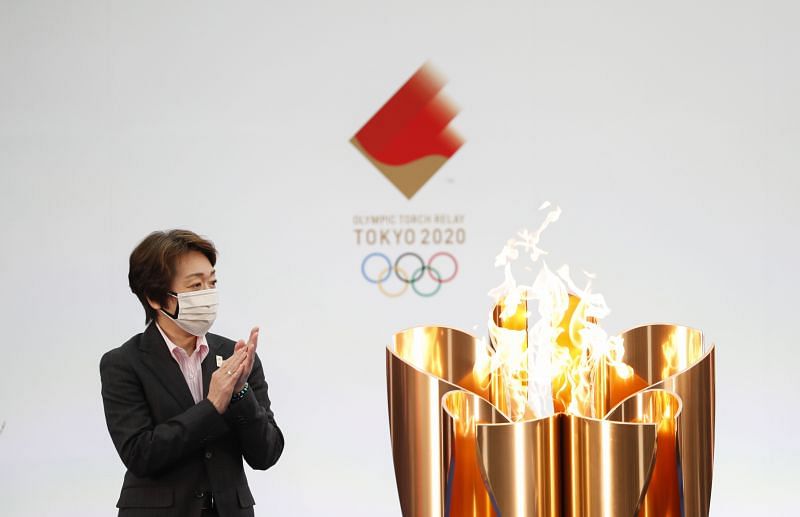 Tokyo 2020 President Seiko Hashimoto next to the celebration cauldron during the opening ceremony ahead of the first day of the Tokyo 2020 Olympic torch relay in Fukushima, Japan