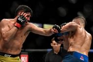 Vicente Luque will be looking to finish Tyron Woodley at UFC 260 this weekend.
