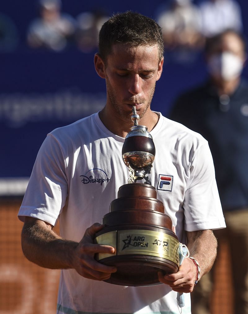 Diego Schwartzman poses with the trophy at the Argentina Open