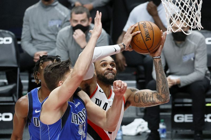 Gary Trent Jr. tries to finish closer to the rim