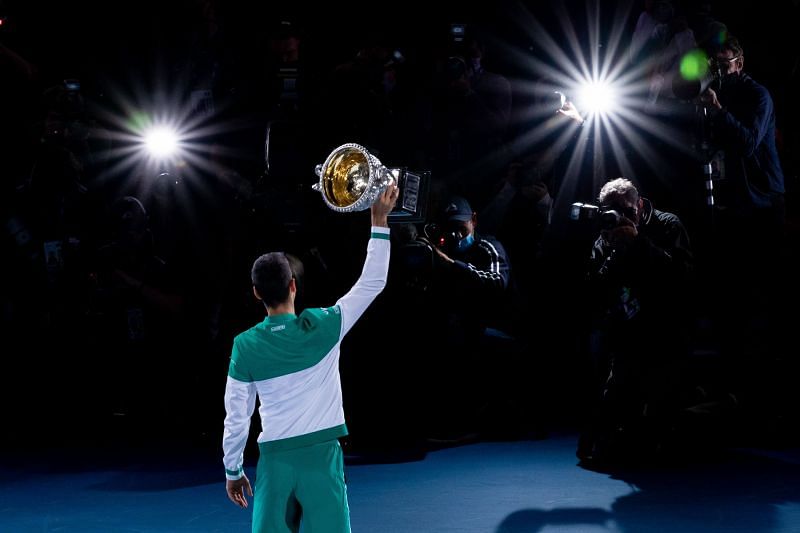 Novak Djokovic poses with the 2021 Australian Open trophy