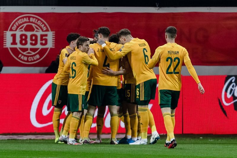 Wales celebrate after scoring early against Belgium.