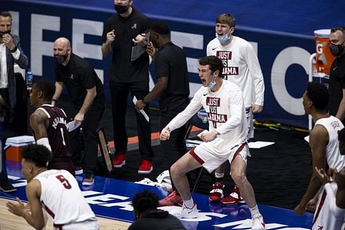 Alabama Crimson Tide bench celebrates during quarterfinal matchup