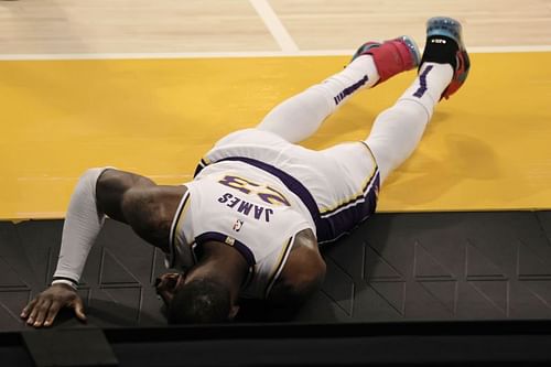 LeBron James #23 of the Los Angeles Lakers reacts to an injury against the Atlanta Hawks at Staples Center on March 20, 2021