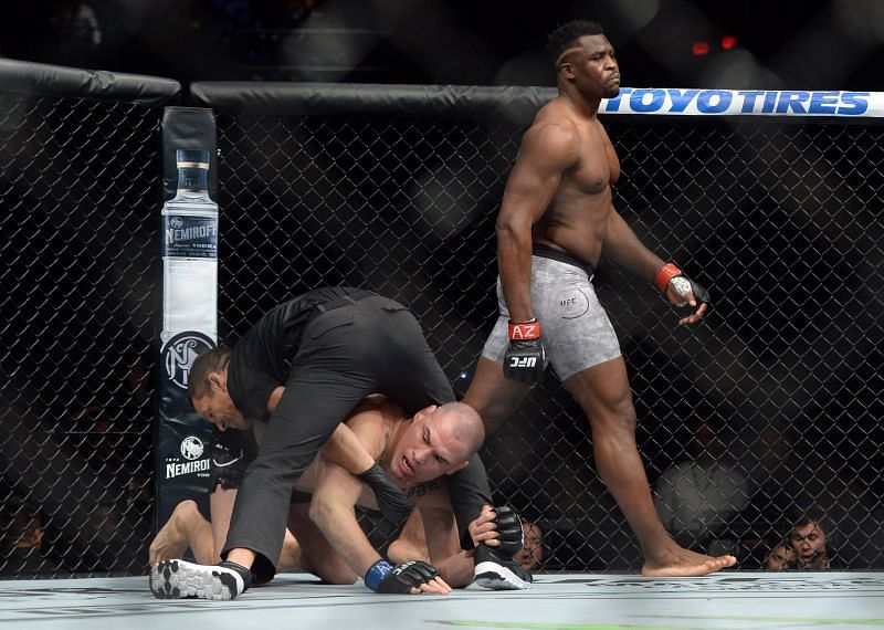 Francis Ngannou walks off after knocking out Cain Velasquez.