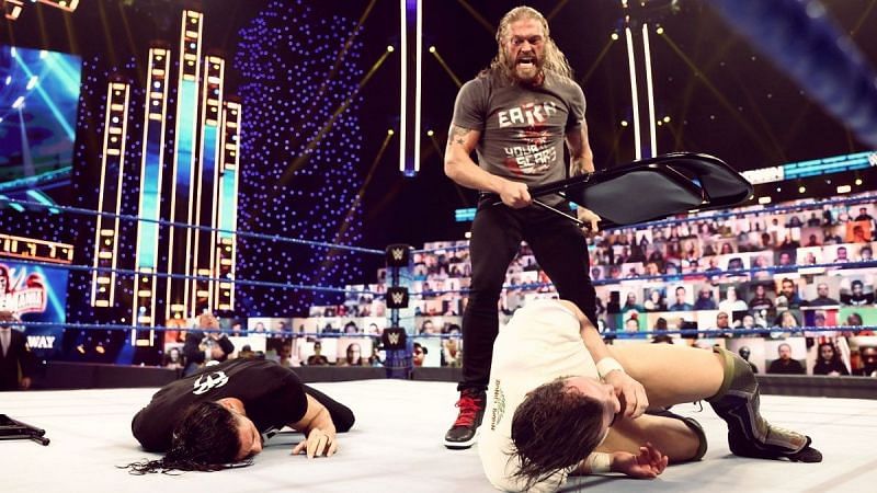 Edge assaults Roman Reigns &amp; Daniel Bryan on SmackDown (Credit: WWE)