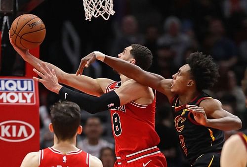 Zach LaVine #8 shoots the game-winning shot and is fouled by Collin Sexton #2. Photo: Jonathan Daniel/Getty Images.