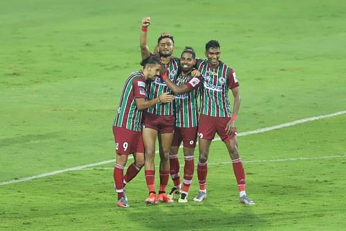 ATK Mohun Bagan players celebrate after scoring their second goal against NorthEast United FC in their ISL match (Image Courtesy: ISL Media)