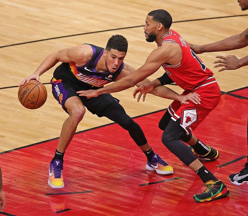 Devin Booker (left)