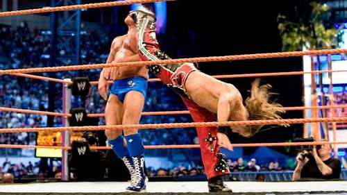 Ric Flair getting hit with Sweet Chin Music at WrestleMania 24