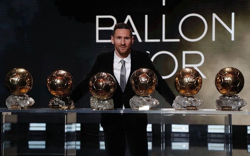 Lionel Messi poses with his record six Ballon d&#039;Or awards