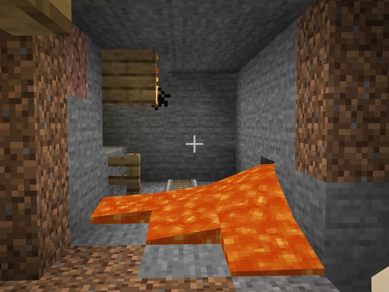 Mineshaft with lava (Image via Minecraft)