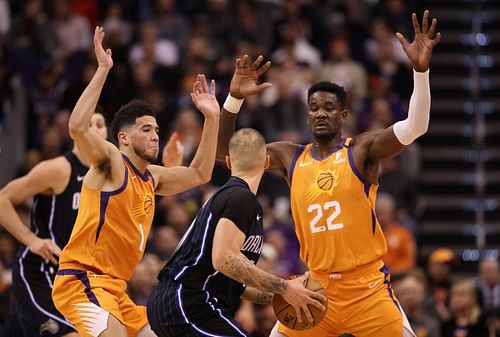 Devin Booker (#1) and Deandre Ayton (#22) of the Phoenix Suns