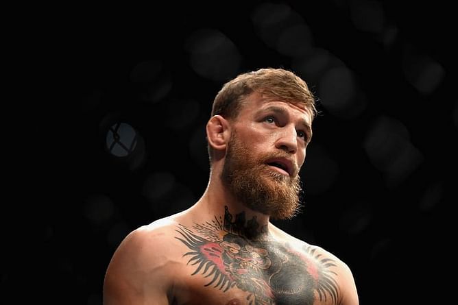 Conor McGregor pays tribute to late UFC referee Neil Hall while watching an old fight