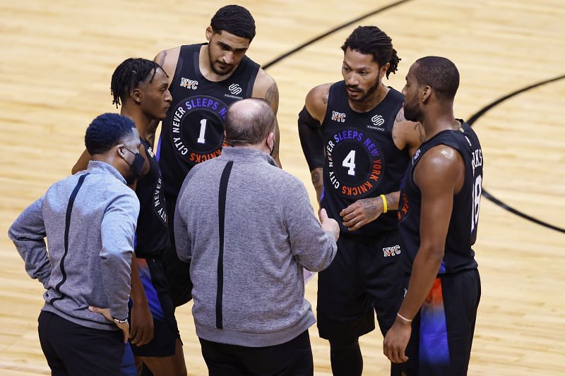 Immanuel Quickley #5, Obi Toppin #1, Derrick Rose #4, and Alec Burks #18 of the New York Knicks