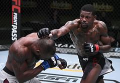 Did Kevin Holland's 5 wins in 2020 give him a UFC record? Which fighters also hold this record?