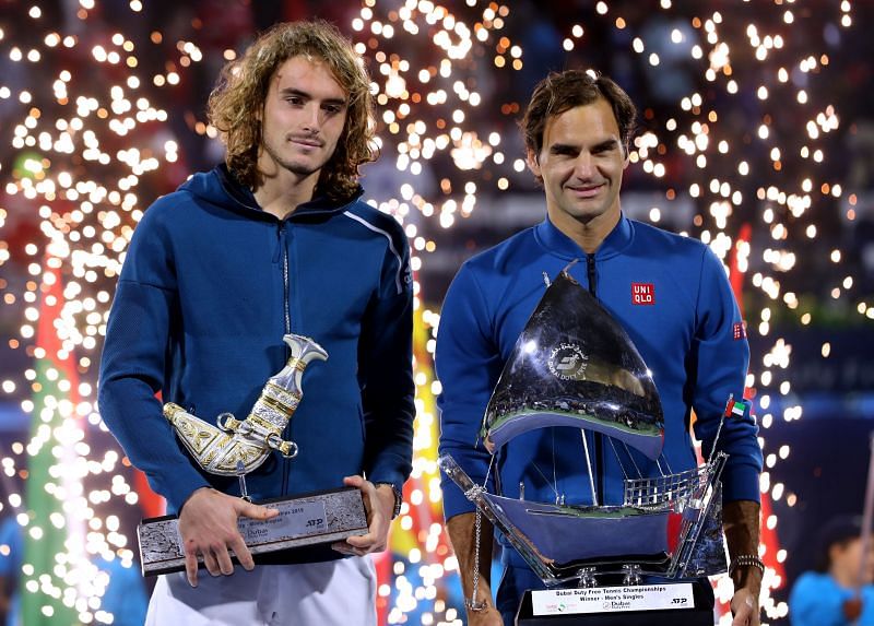 Stefanos Tsitsipas (L) and Roger Federer