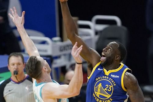 Draymond Green snatches the ball from Gordon Hayward