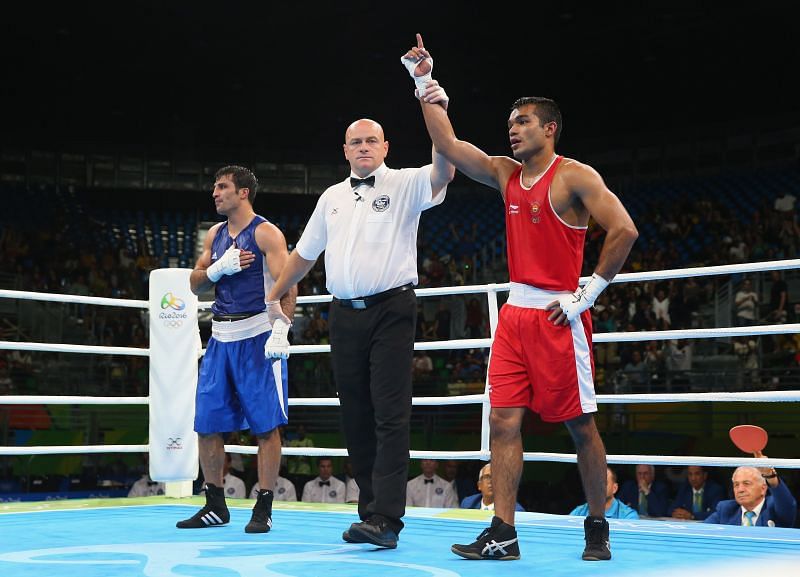 Vikas Krishan of India (in Red) at the 2016 Rio Olympics