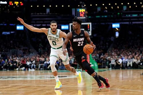 Jayson Tatum #0 defends Jimmy Butler #22. (Photo by Maddie Meyer/Getty Images)