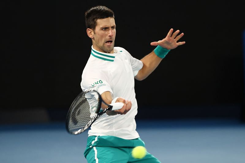 Novak Djokovic hits a forehand