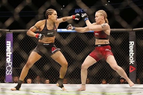 Amanda Nunes (left); Valentina Shevchenko (right)