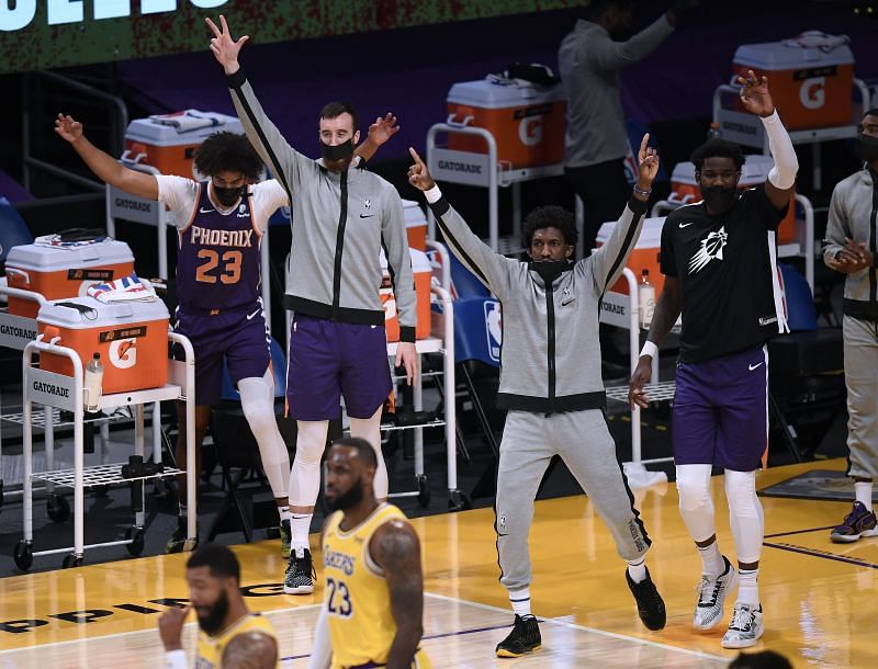 The Phoenix Suns celebrate their win in Los Angeles.