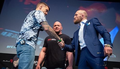 Dustin Poirier (left); Dana White (center); Conor McGregor (right)