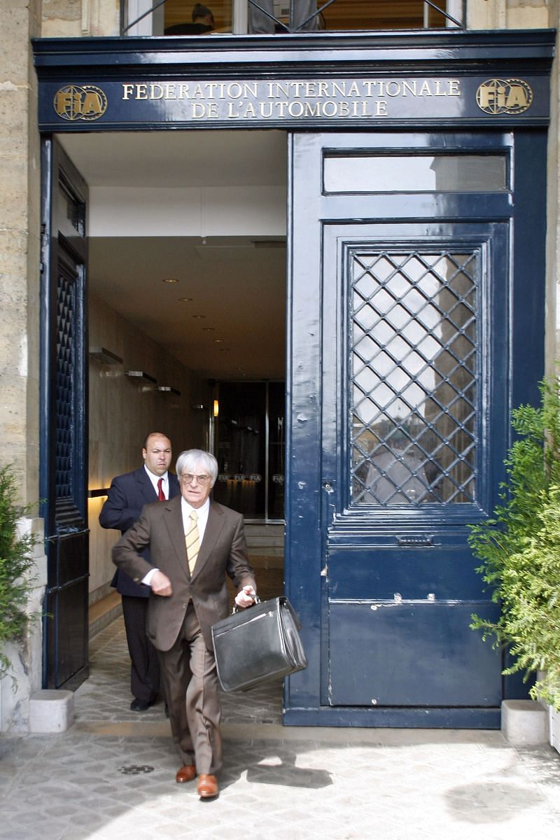 Bernie Ecclestone leaves at the FIA headquarters after the hearing. Photo: Pascal Parrot/Getty Images.