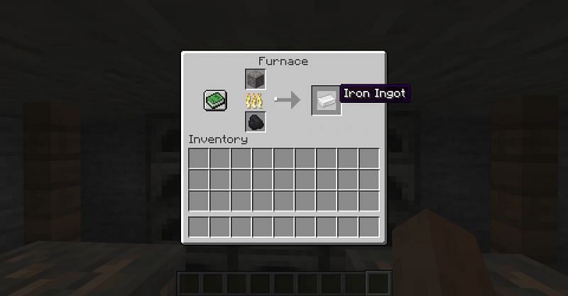 Smelting iron ore into iron ingots at a furnace in Minecraft. (Image via Minecraft)