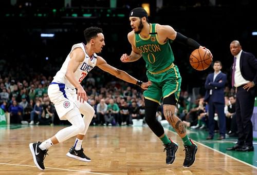 Landry Shamet (#20) of the LA Clippers defends against Jayson Tatum (#0) of the Boston Celtics