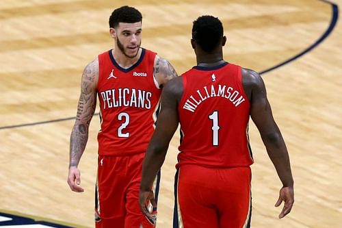 Zion Williamson #1 and Lonzo Ball #2 of the New Orleans Pelicans stand on the court during the fourth quarter of an NBA game. (Photo by Sean Gardner/Getty Images)