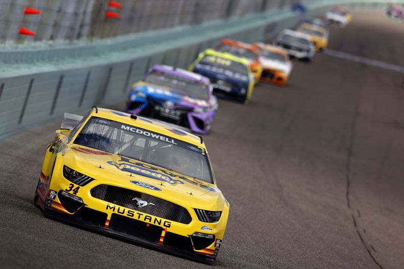 Michael McDowell races in the top 10 in the NASCAR Cup Series Dixie Vodka 400. Photo/Getty Images