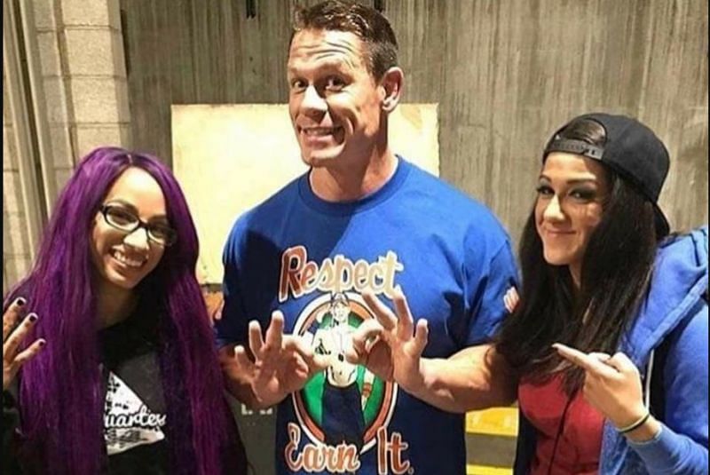 Sasha Banks, John Cena, and Bayley